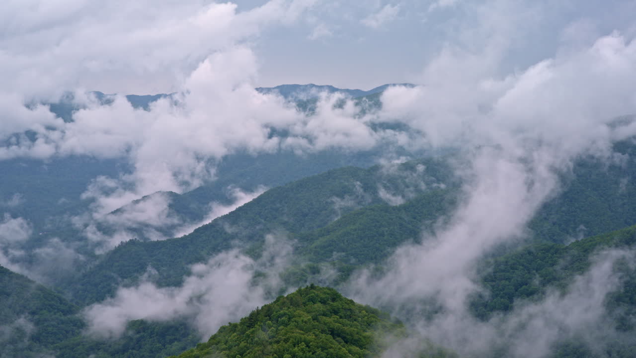 Fog and mist swirl through the Smoky Mountains in this aerial view
