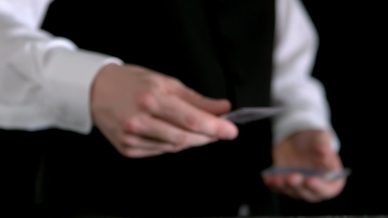 Dealer throwing cards