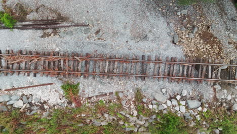 Elevating-Aerial-View:-Damaged-Train-Tracks-from-Above,-Rapidly-Rising-in-Post-Flood-Vermont