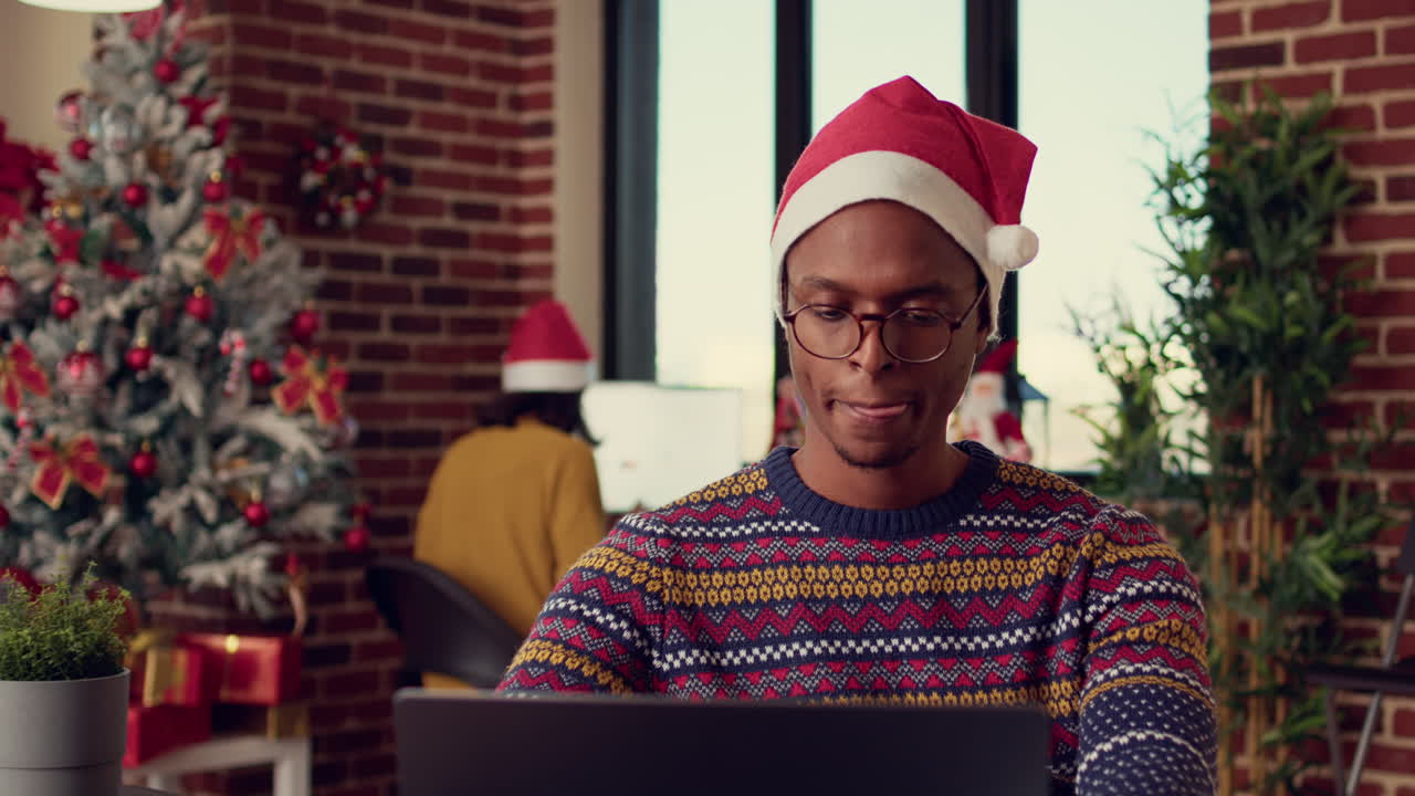 African american man browsing internet on laptop