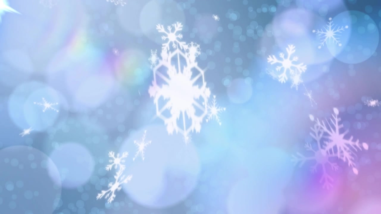 藍色背景上，雪花動畫覆蓋在燈光和圓點之上。