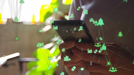 animation of network of digital icons over woman using smartphone