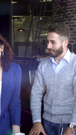 couple walking in a cafe