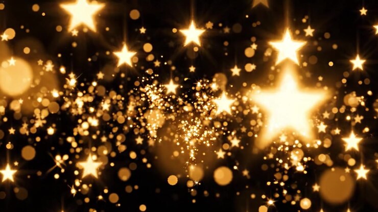 Uno spettacolo accattivante di stelle scintillanti e luci bokeh dorate che creano un'atmosfera magica, perfetto per celebrazioni e occasioni festive.