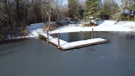 Drone-Video-Of-A-dock-In-The-Snow-And-Ice