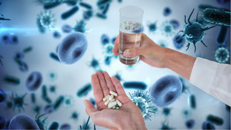 persona que sostiene pastillas contra la infección bacteriana en el vapor de sangre 4k