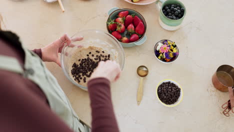 cooking, fruit and pancakes with hands of person