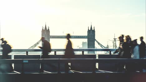 time-lapse of commuters crossing london bridge at morning rush hour