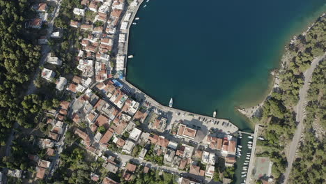 densely packed homes of lagkada waterfront village on chios, greece