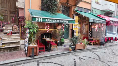 pan-cake house in a snowy street