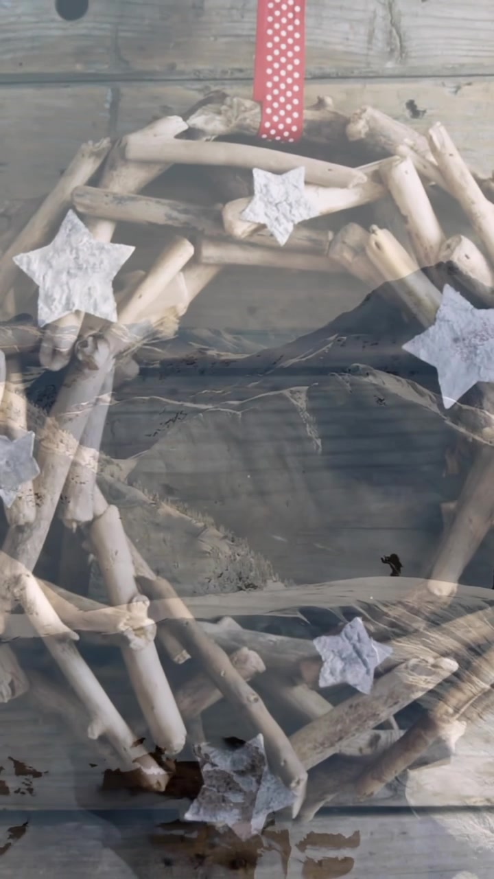 Animation of rustic christmas decoration over winter scenery