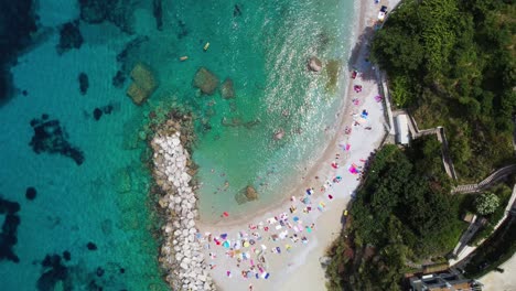 capri, italy: aerial view of famous italian island near naples, north region marina grande, clear turquoise sea water and beach spiaggia di cala grande - landscape panorama of europe from above