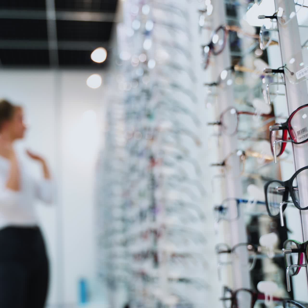 Woman buying new glasses