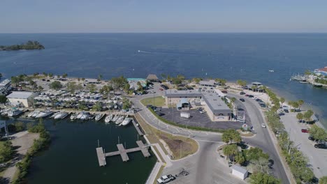 4K-Drone-Video-of-Beach-Park,-Marina,-and-Waterfront-Homes-in-Hudson-Beach-on-the-Gulf-of-Mexico-in-Florida