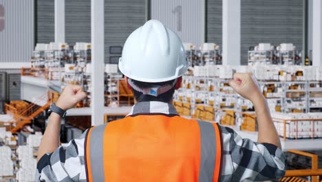 warehouse worker celebrating achievement