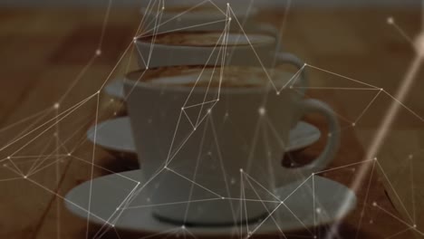 animación de la red de conexiones sobre tazas de café