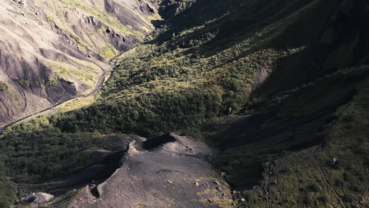 Aerial thorsm&ouml;rk grassy forest mountains, famous icelandic national park landmark landscape November