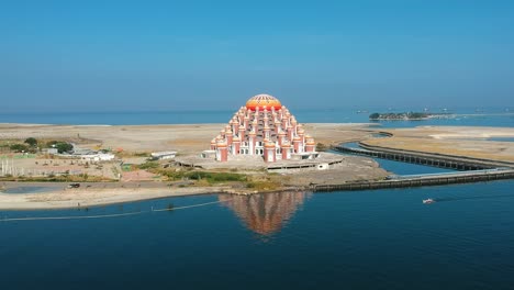 Aerial-of-unique-Asmaul-Husna-99-Dome-Mosque-in-Makassar,-Sulawesi,-Indonesia