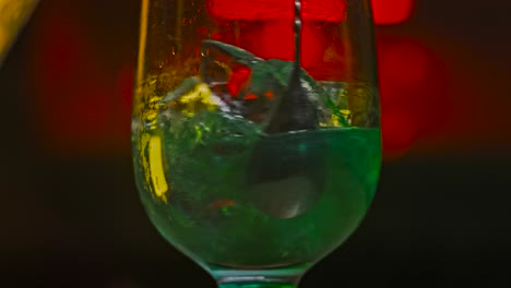 close-up of a green cocktail with ice