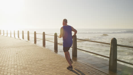 senior man running on the promenade