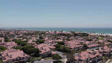 condos and homes near the beach at oxnard shores in ventura, california - beautiful drone footage of a sunny day and pacific ocean