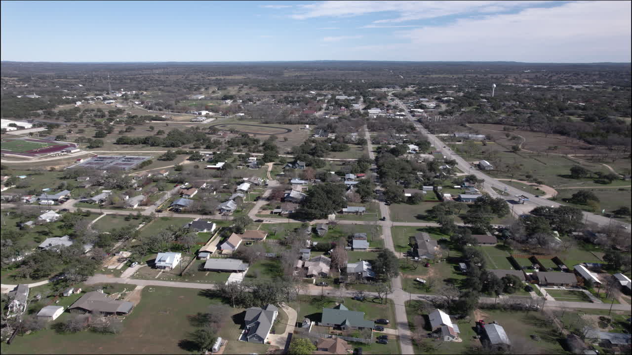 Aerial Shot over Johnson City, Texas and Hill Country, small town