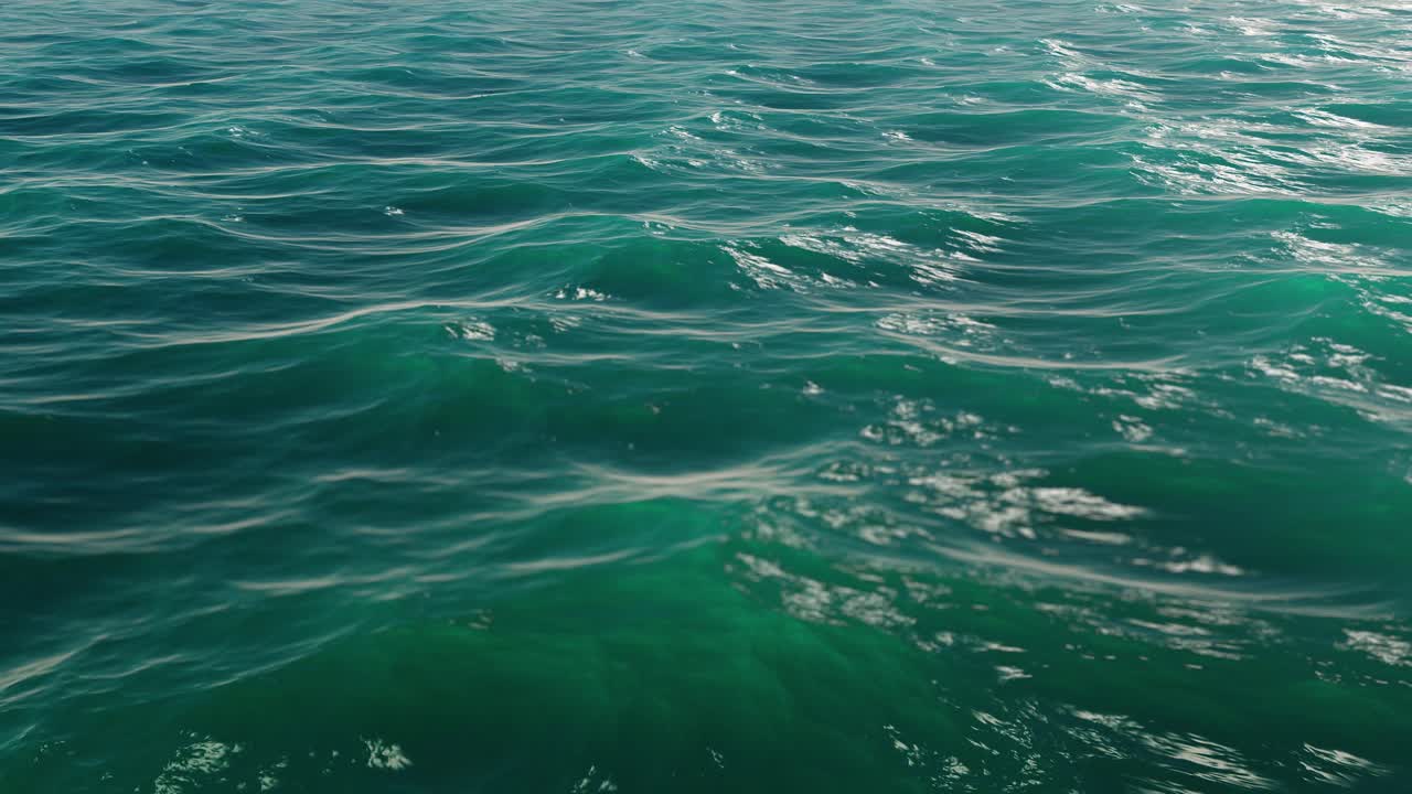 imágenes generadas por computadora de las olas del océano azul. - animación