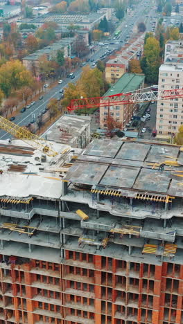 labor working at construction site. aerial shot of the building in the process of construction