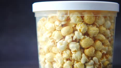 caramel popcorn in a clear container