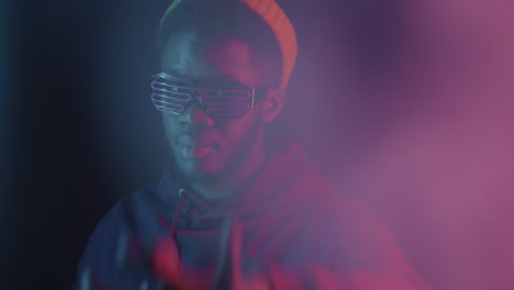 stylish man in neon lights