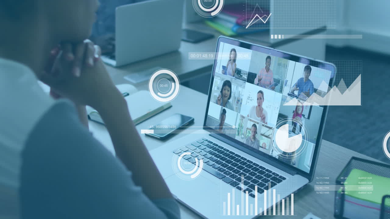 woman sitting at desk listening in business meeting with floating charts, timers and progress rings
