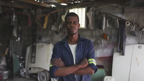 african handyman looking at camera