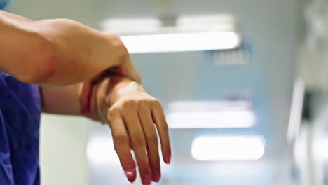 hygiene, health care and safety concept, male doctor wash hands before surgery operation, clean the dirt, in sterile operating room
