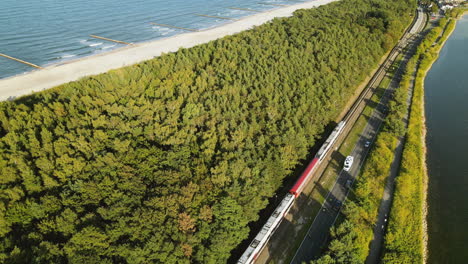 Train-approaching-railway-station-on-Hel-Peninsula,-Poland