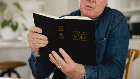 Senior-man,-hands-and-bible-study-with-reading