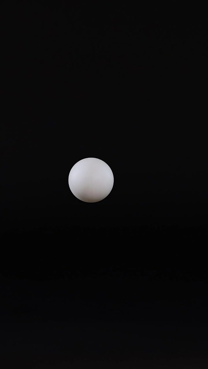 Tennis ball moves across a black grid