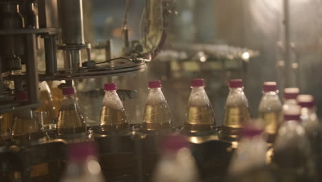 automated bottle filling and capping machine in a production facility