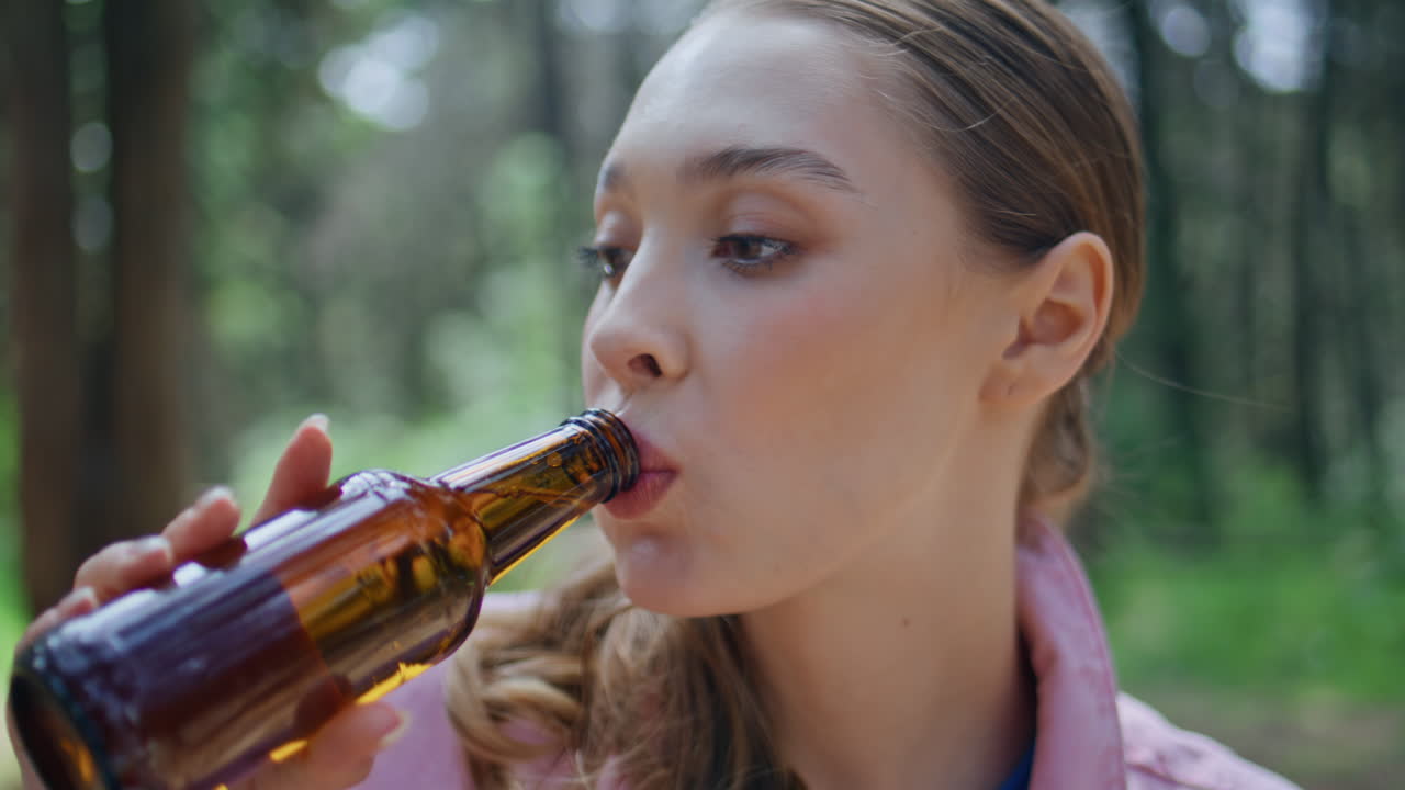 Portrait woman talking to unknown interlocutor at sunny nature