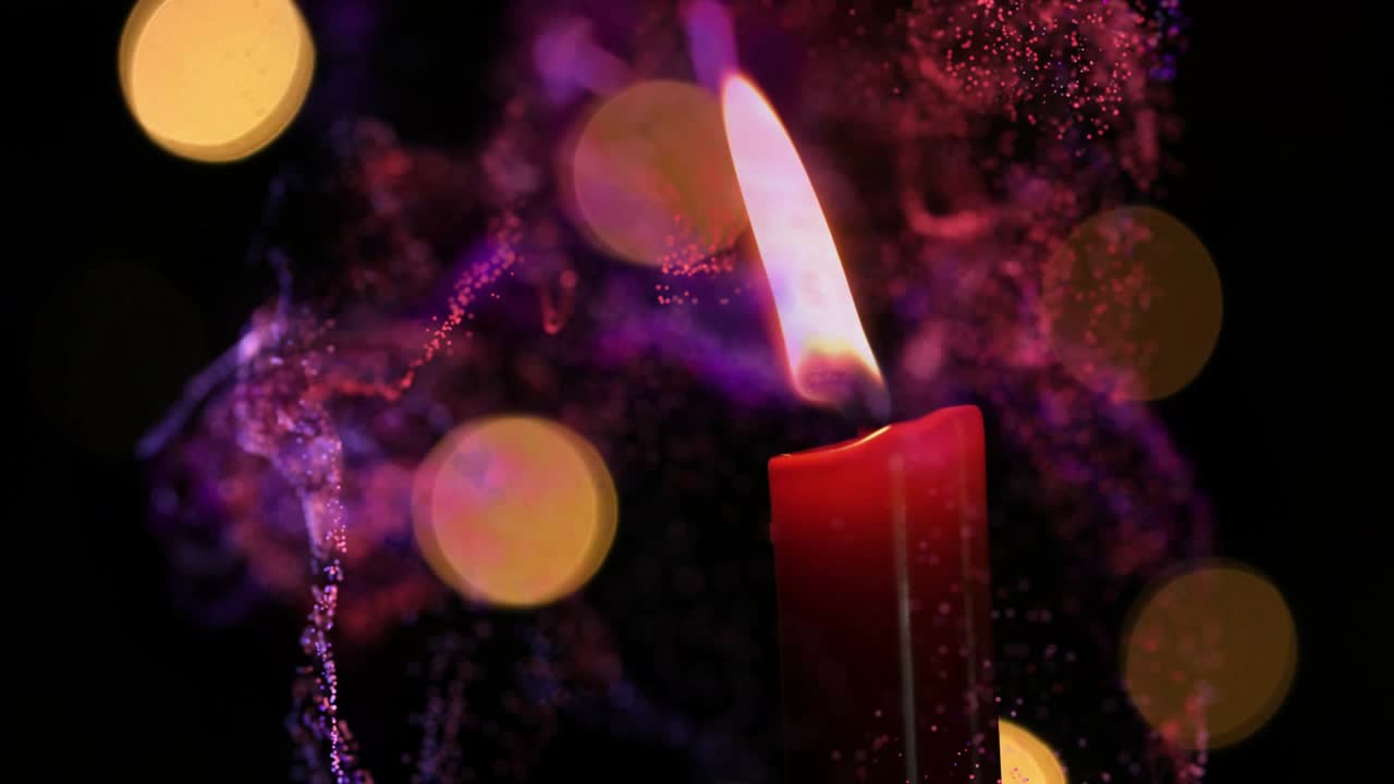 Metal lighter flame touching wick, igniting flame and colored smoke swirling upward for warm glow