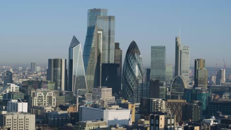 aerial establishing dolly left shot of the city of london scrapers