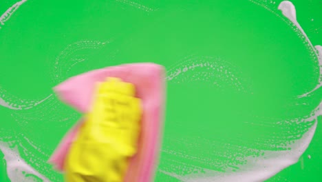 window cleaning with soap and sponge