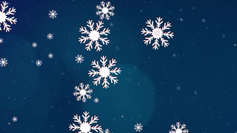 animación de copos de nieve de navidad cayendo sobre un fondo azul