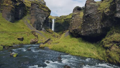 iceland beautiful remote ravine with kvernufoss watterfall. colorful outdoor mountain scene of nature
