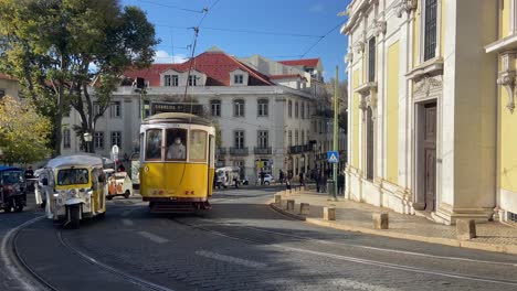 electric trams and tuk tuk tricycles serve the transport needs of lisbon's locals and tourists alike