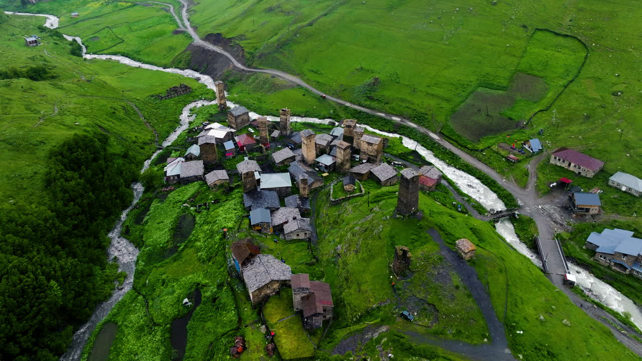 Above View Of Svan Houses With Medieval Watchtower In Ushguli, Svaneti Region, Georgia.