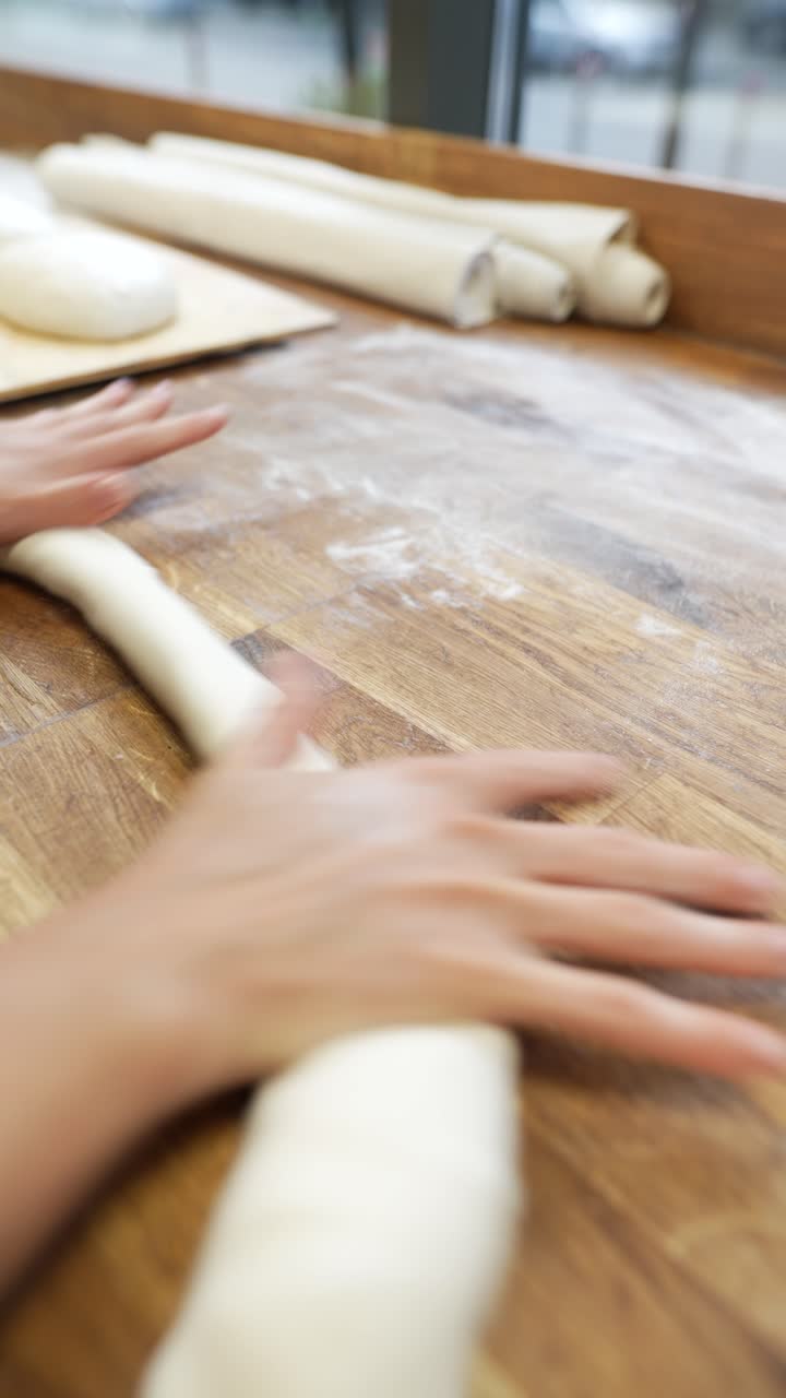 Rolling Dough in a Bakery