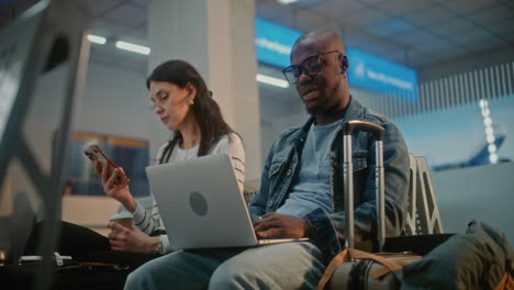 passengers waiting at the airport