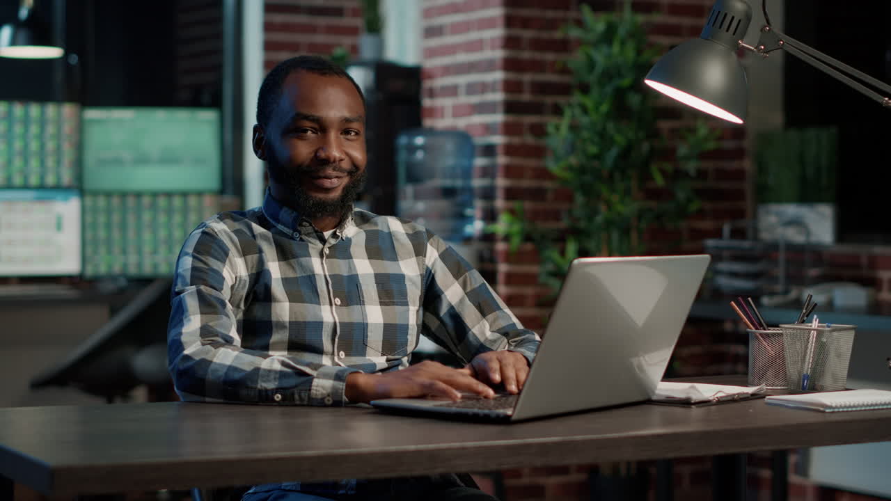 Portrait of male consultant working on stock trade sales