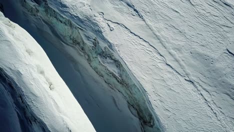 streaks of a blue glacier in the swiss alps, saas fee