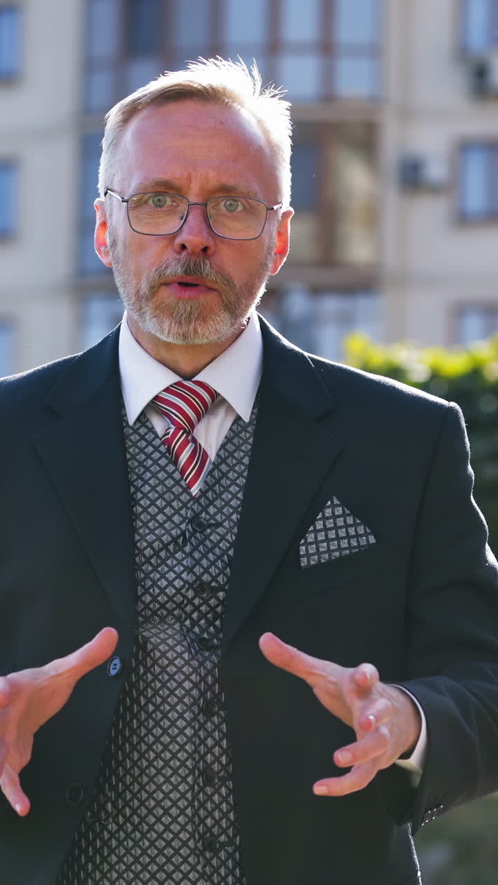 Man reporting on the street. Journalist reporting on the street in city Vertical video